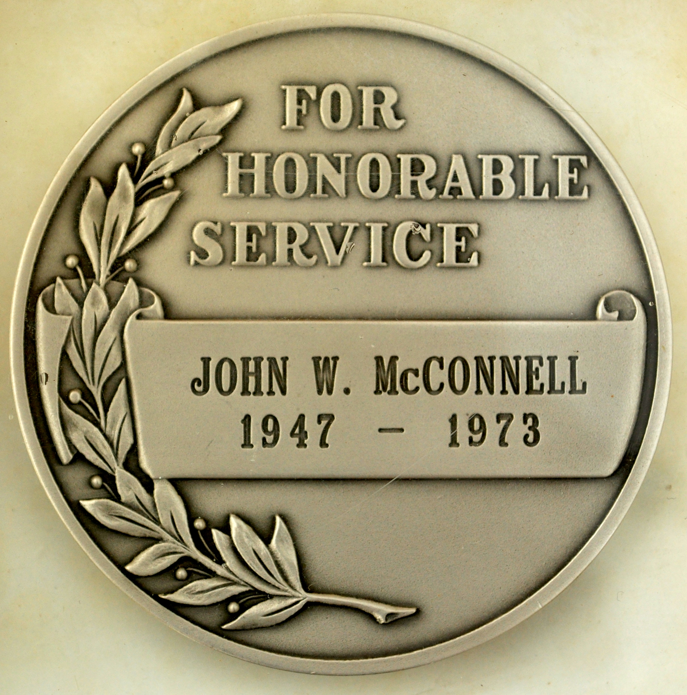 John W. McConnell’s CIA medal (back)